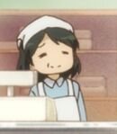 Lady in the School Shop